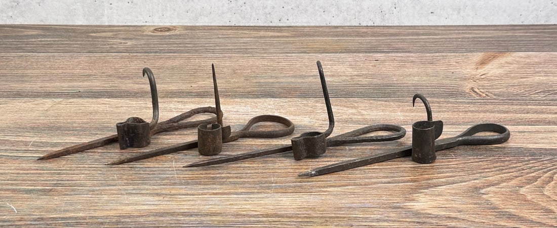 Collection of Butte Montana Miners Candlesticks: Largest is 9 1/4" long.