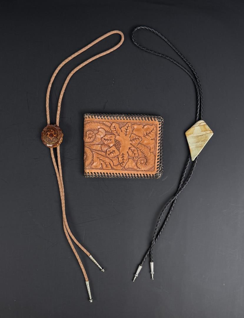 Group of Mens Western Accessories: Two Bolo Ties and a nice tooled leather wallet.