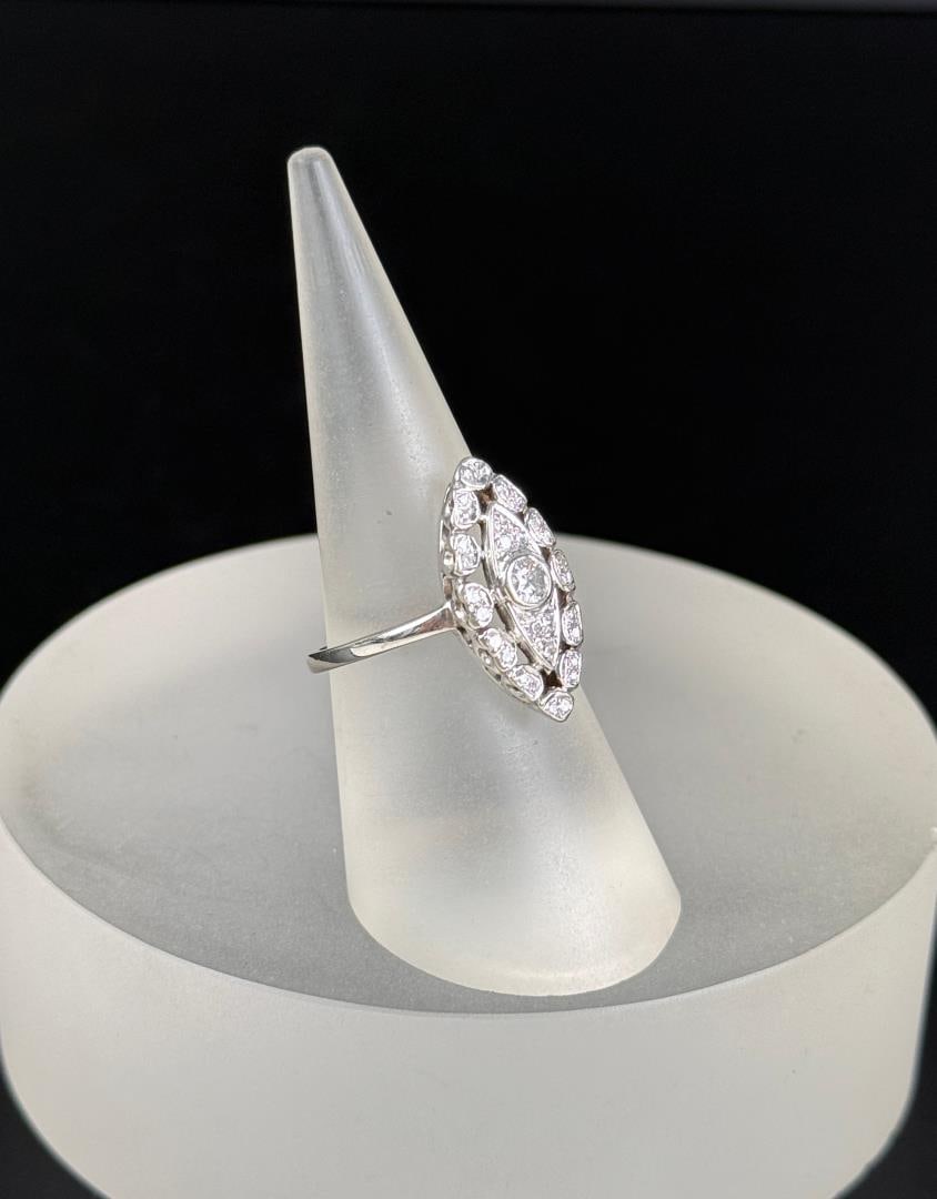 Art Deco 14k White Gold and Diamond Ring: 4.54 grams, size 7 1/2. Lot requires payment via non credit card only.