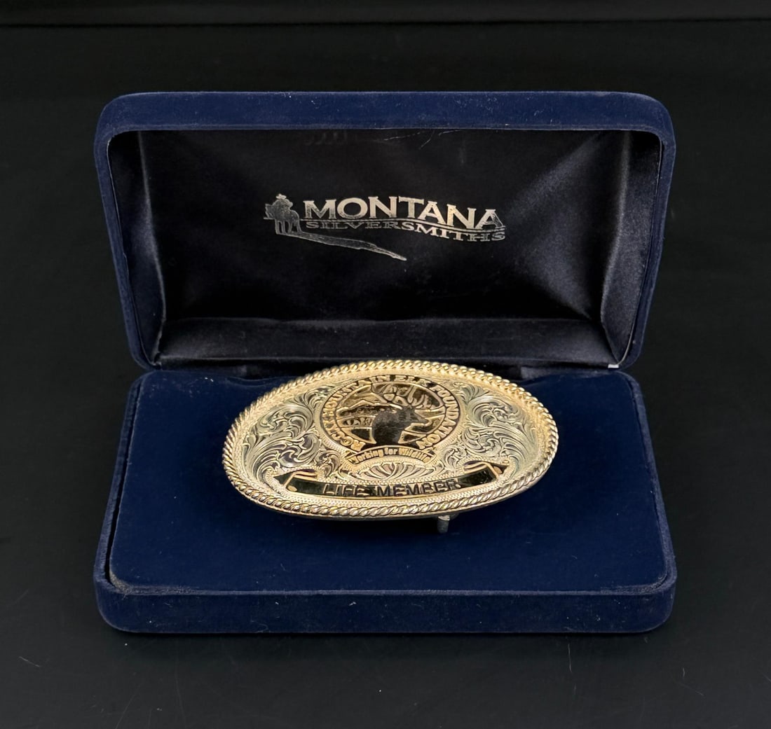 Montana Silversmiths RMEF Elk Belt Buckle: Nice example in box. Buckle is 3 5/8" by 2 5/8".