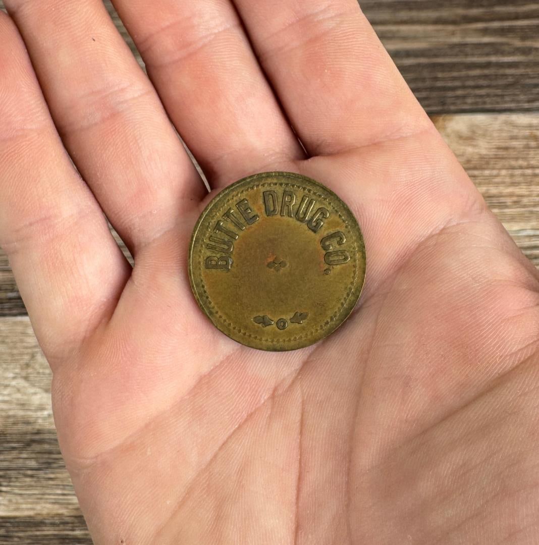 Butte Drug Co Montana Trade Token: Good for 50c in merchandise.