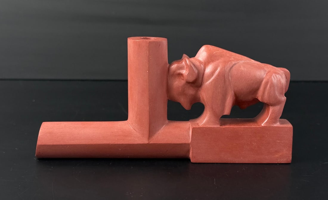 James Under Baggage Sioux Catlanite Pipe Bowl: Nice buffalo and wolf design. 7" by 3 3/8" by 7/8".