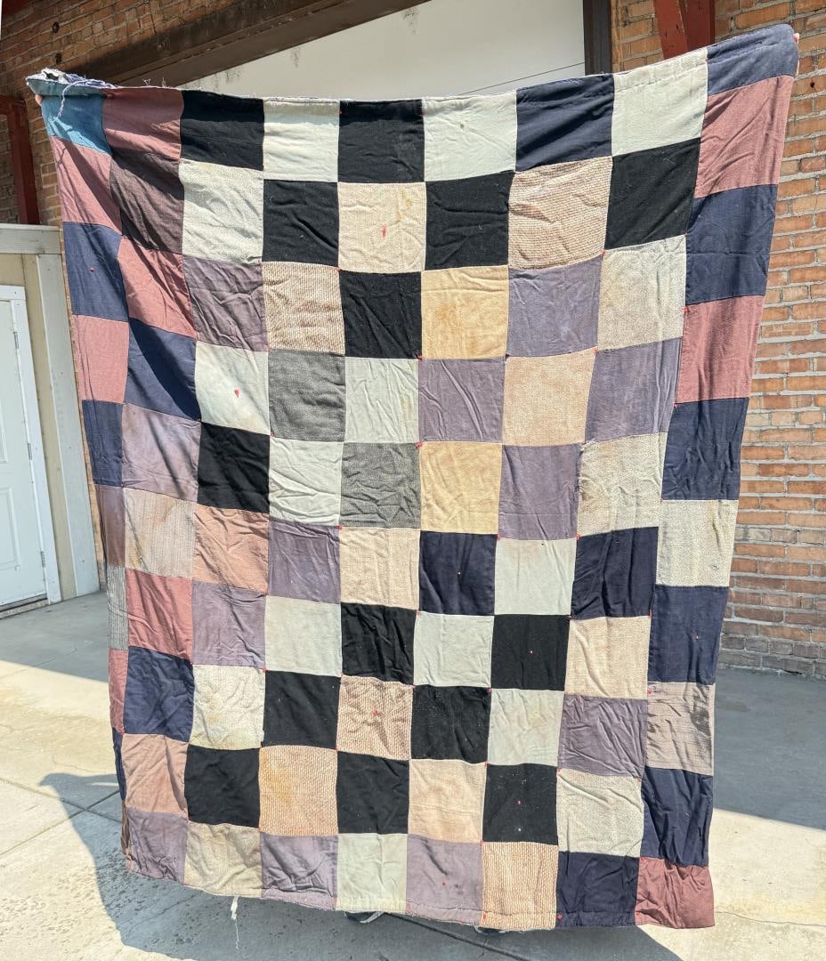 Antique Checkerboard Farmhouse Feedsack Quilt: 65" by 76 1/4" long. Staining throughout quilt, large tear and wear to back fabric.