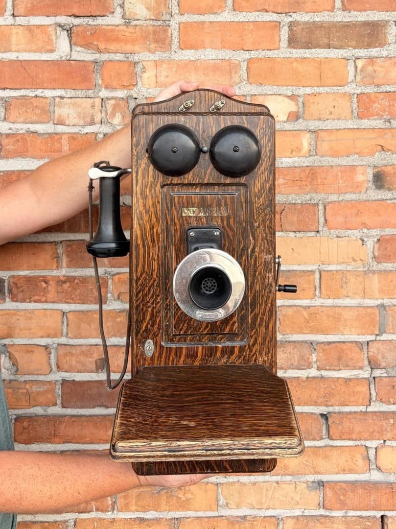 Western Electric 317 Oak Wall Crank Telephone: 9" by 12" by 23".