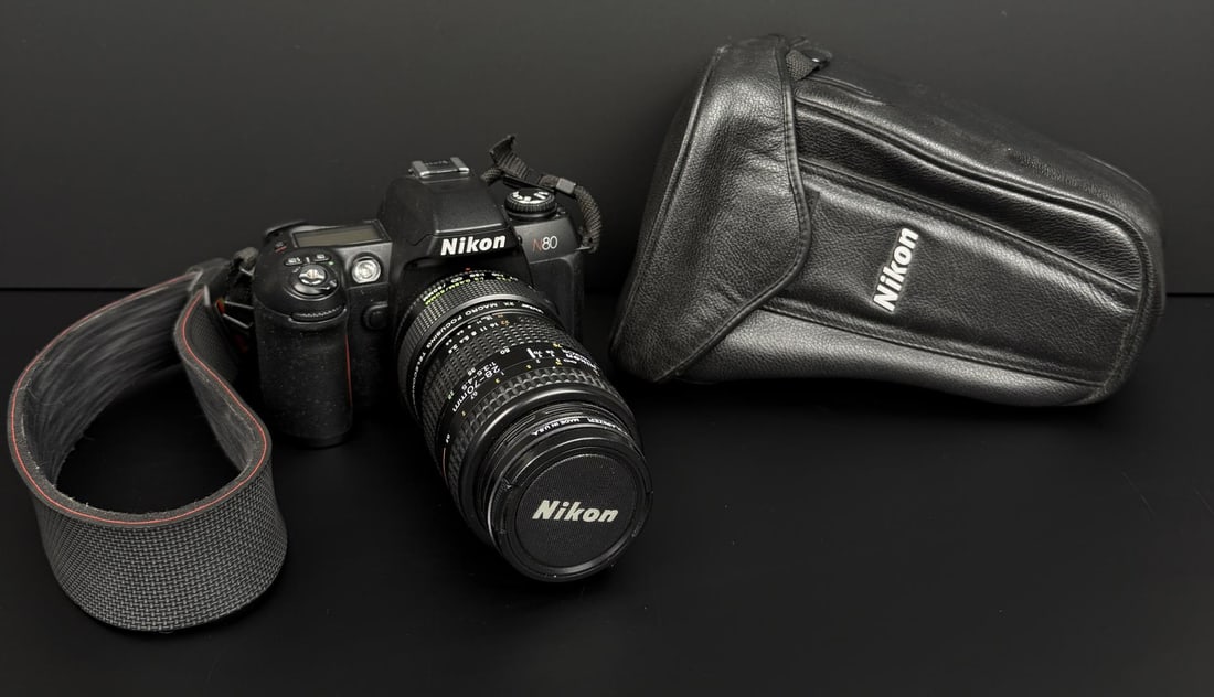 Nikon N80 SLR Film Camera: Comes with Nikon AF Nikkor 28-70mm 3.5-4.5 Lens. Working condition.