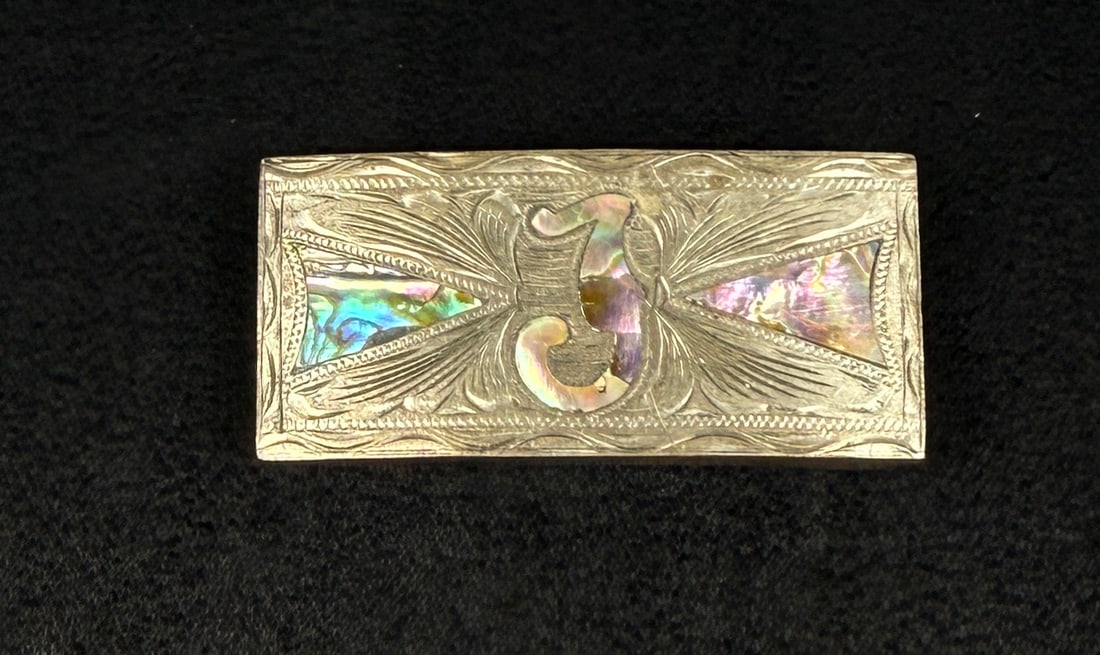 Sterling Silver Abalone Cowboy Belt Buckle: 1" by 2 1/4". 24.44 grams.