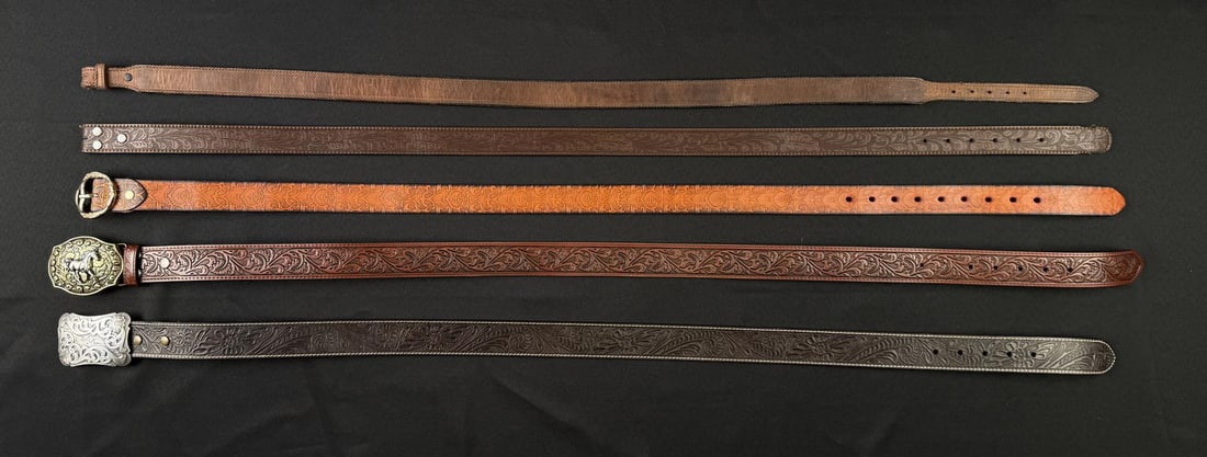 Group of Tooled Leather Cowboy Belts: Nice grouping.