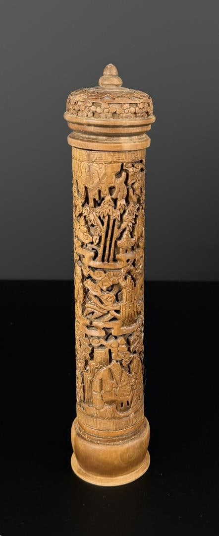 Chinese Bamboo Carved Scroll Holder: 11 1/4" by 2 1/4" by 2 1/4". Imagery depicts mountains, scholars, trees, clouds, and fret borders.