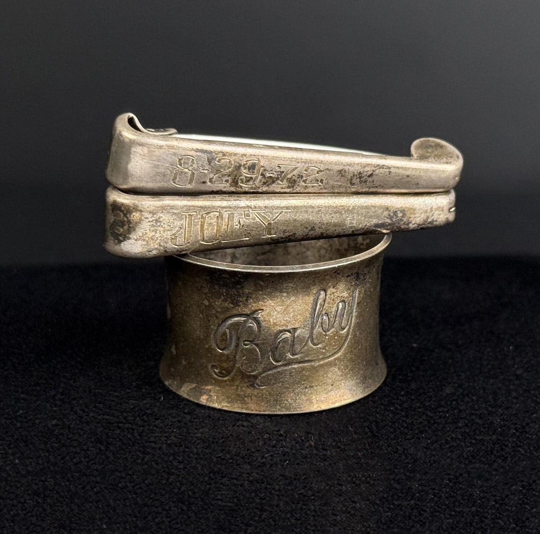 Sterling Silver Diaper Pins and Napkin Ring: Napkin ring is not sterling silver. Pins weigh at 9.98 grams.