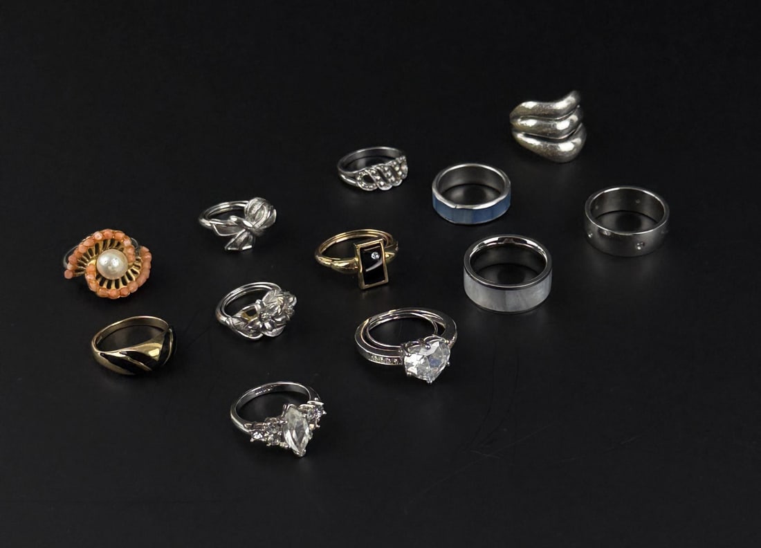 Collection of Costume Jewelry Rings: 12.24 grams of sterling silver.
