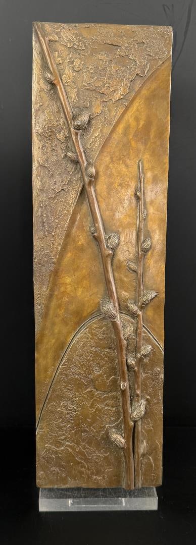 Mark Leichliter Pussy Willow Bronze: Title is Pussy Willow. 15 1/4" by 4 3/8" by 5/8". 2/20. Mark Leichliter. 20th century. Known for: Sculptor-abstract nature. A lifelong resident of Loveland, Colorado, he apprenticed with Dan Ostermill