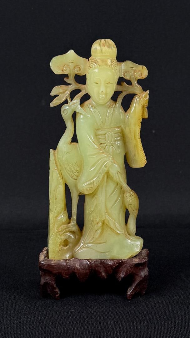 Chinese Serpentine Carved Guanyin Figure: 7 3/4" by 3 1/2" by 1 1/2"