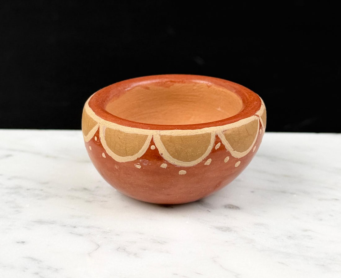 Celestina Naranjo Miniature Santa Clara Pueblo Pot: 2 1/8" diameter, 1" tall.