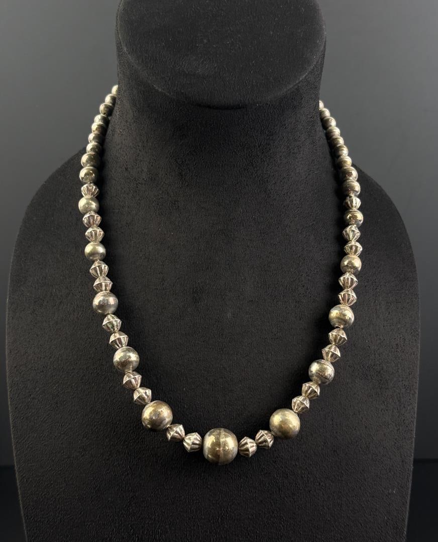 Navajo Sterling Silver Bench Bead Necklace: 41.26 grams. 11 1/2" long as displayed.