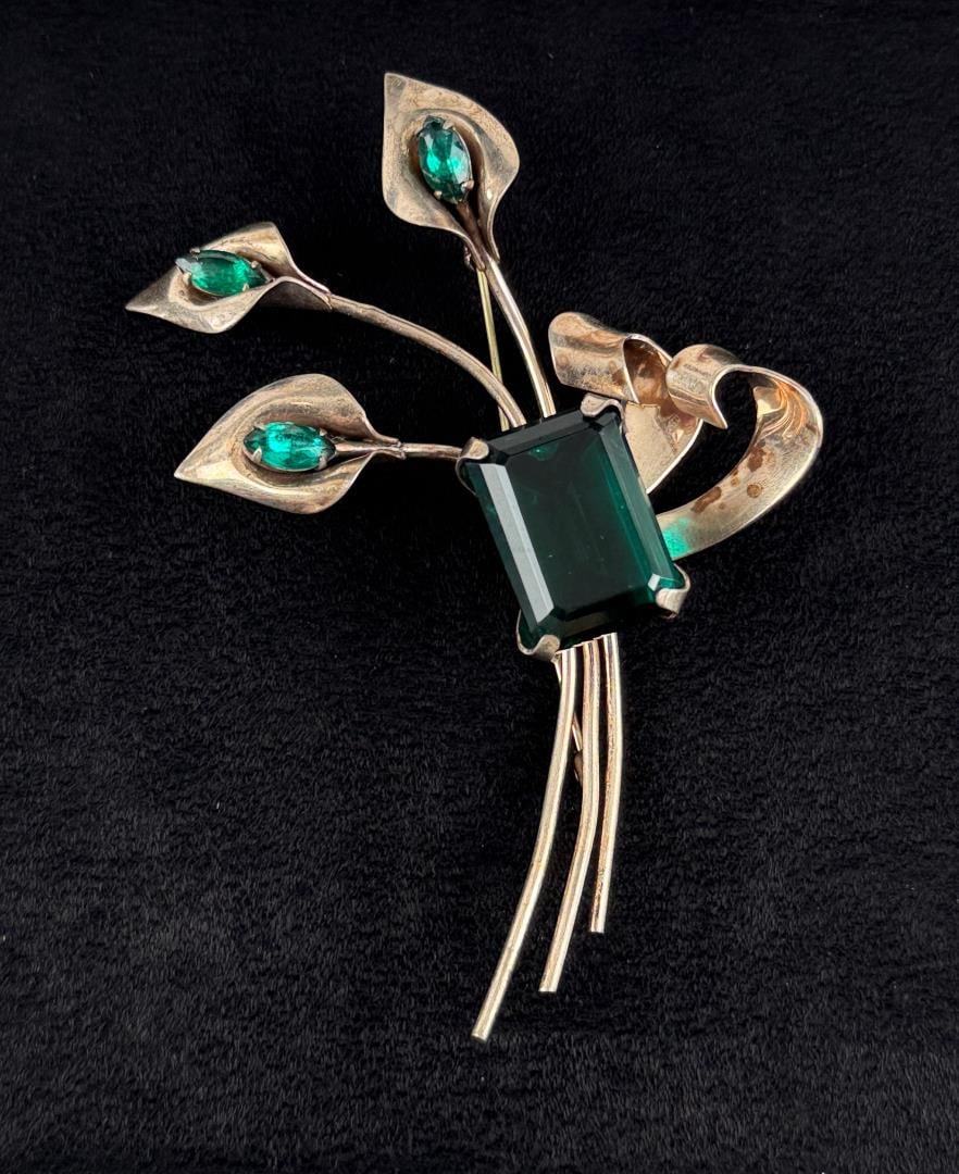 Sterling Silver Rhinestone Flower Brooch: 23.34 grams. 3 3/4" by 2 3/8" by 5/8".