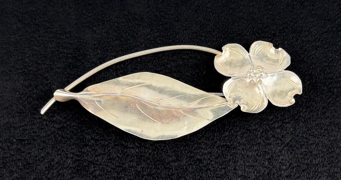 Stuart Nye Sterling Silver Dogwood Flower Brooch: 7.10 grams. 3 1/4" by 1 1/2" by 1/4".