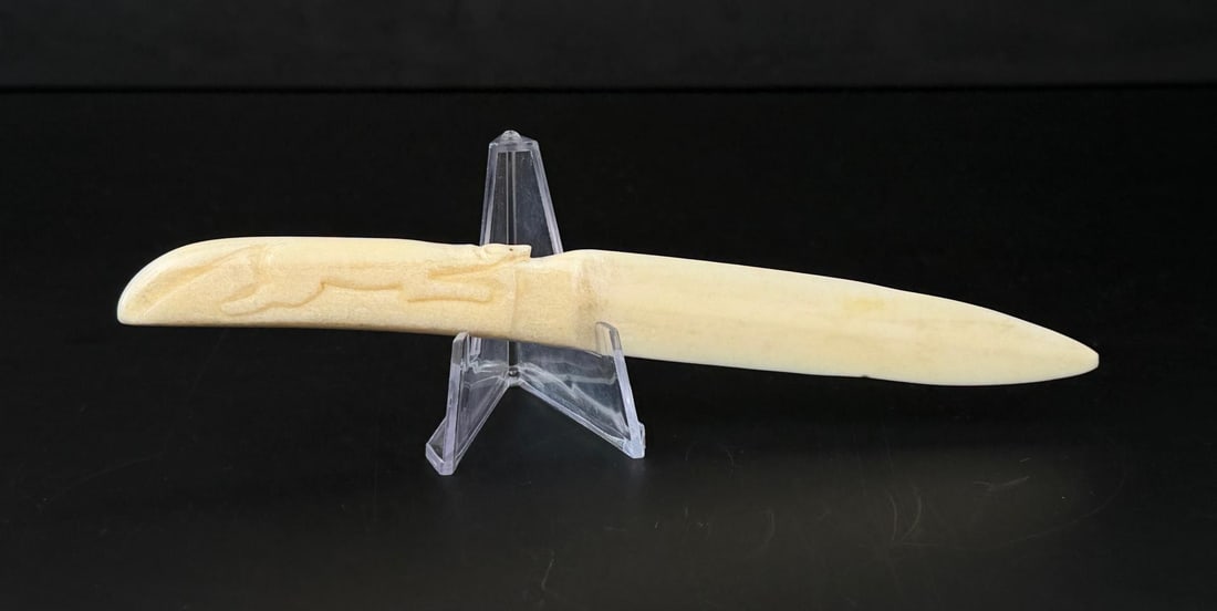 Alaskan Inuit Eskimo Walrus Ivory Letter Opener: 7 1/4" long. This item cannot be shipped to Oregon, California, Hawaii, New York, New Jersey, Internationally, or any other state that prohibits.
