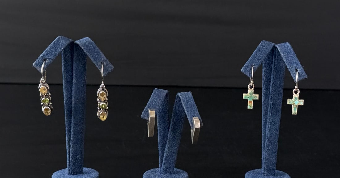 Sterling Silver Earrings: 8.83 grams.
