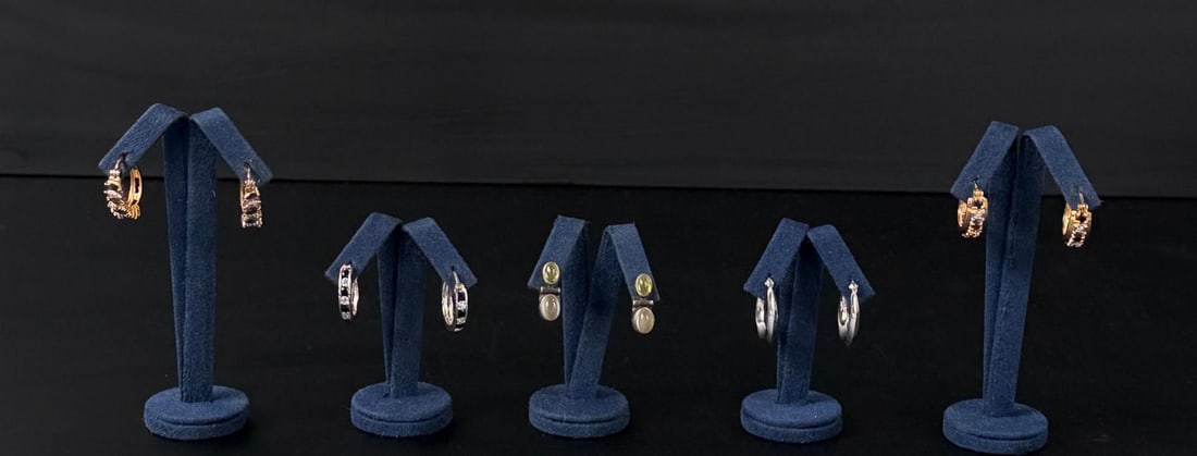 Sterling Silver Earrings: 18.04 grams.