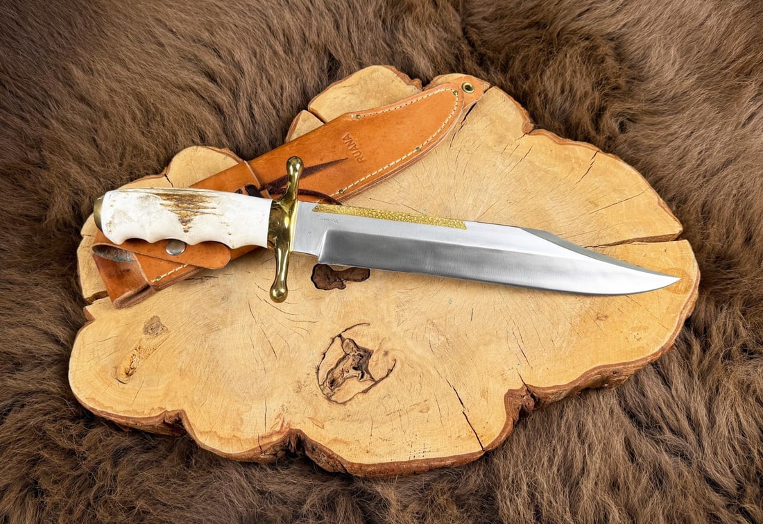 Ruana Bonner Montana Non Catalog Vic Bowie Knife: Signed by Vic Hangas. Non Catalog Special Order. Never used or carried. 17 1/2" long.