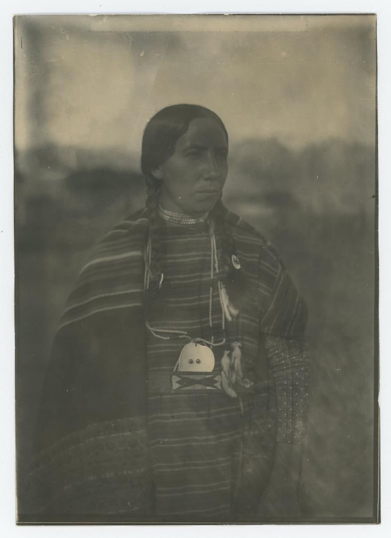 Edward Boos Flathead Indian Montana Photo: 5" by 7". Unidentified subject. Boos' Flathead Reservation portraits document particularly insightful details regarding the lifestyle, possessions, and landscapes of tribal members just prior to the 1