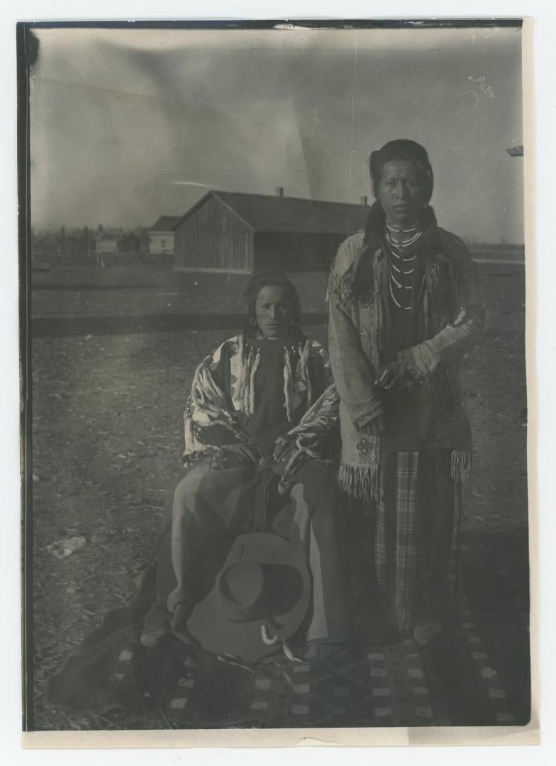 Edward Boos Flathead Indian Montana Photo: 5" by 7". Subjects are Skukusse and Pix-On-Che-La Hoit (Hunts Alone). Boos' Flathead Reservation portraits document particularly insightful details regarding the lifestyle, possessions, and landscapes