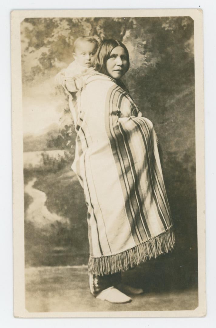 Last Member of the Osage Tribe RPPC Postcard: Poignant Indian postcard. Subject is identified on back as Edith Ware and papoose, last members of Osage tribe.