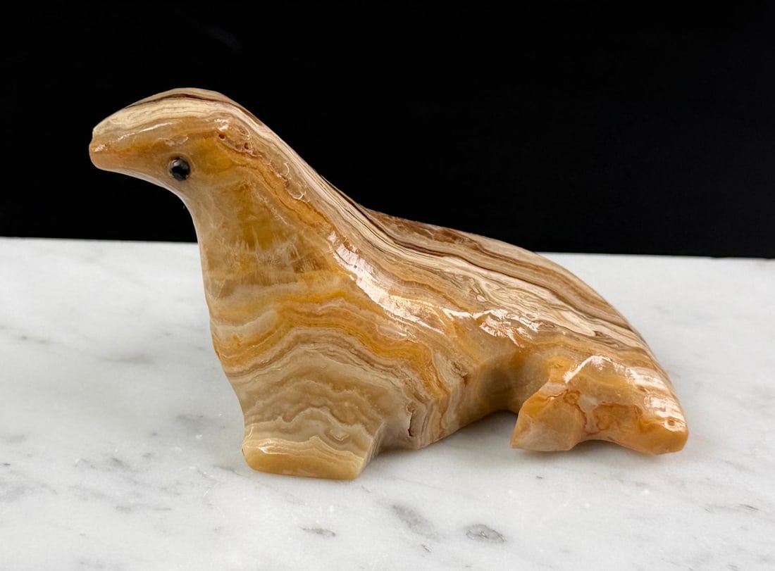 Carved Onyx Seal: 2 3/4" by 1 1/2" by 1 1/2".