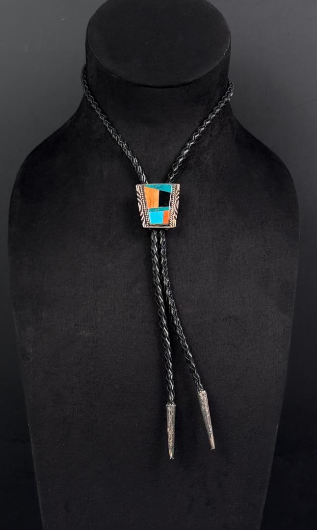 Donald Douglas Navajo Sterling Silver Bolo Tie: 21 3/4" long.