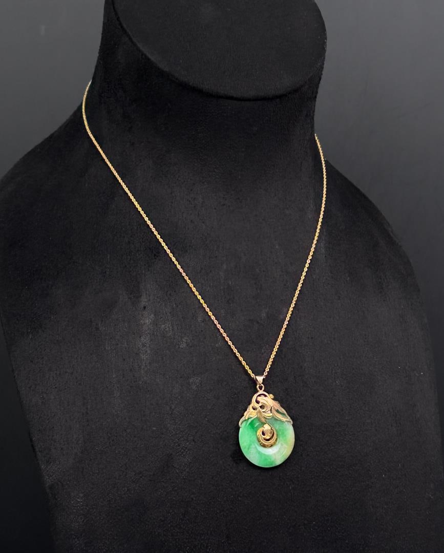Chinese 14K Gold Jade Disc Pendant: 10" long as displayed. 7.78 grams. Lot requires payment via non credit card only.