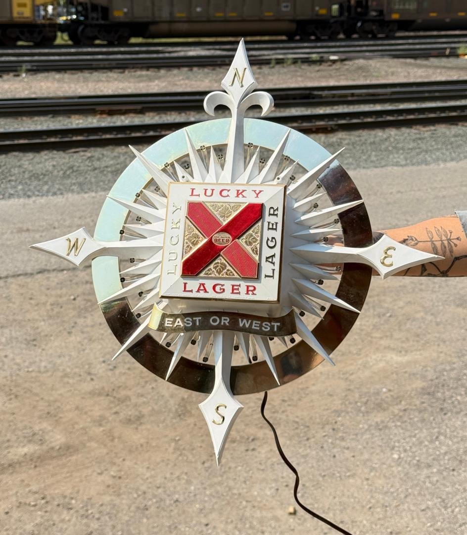 Lucky Lager East or West Compass Lighted Beer Sign