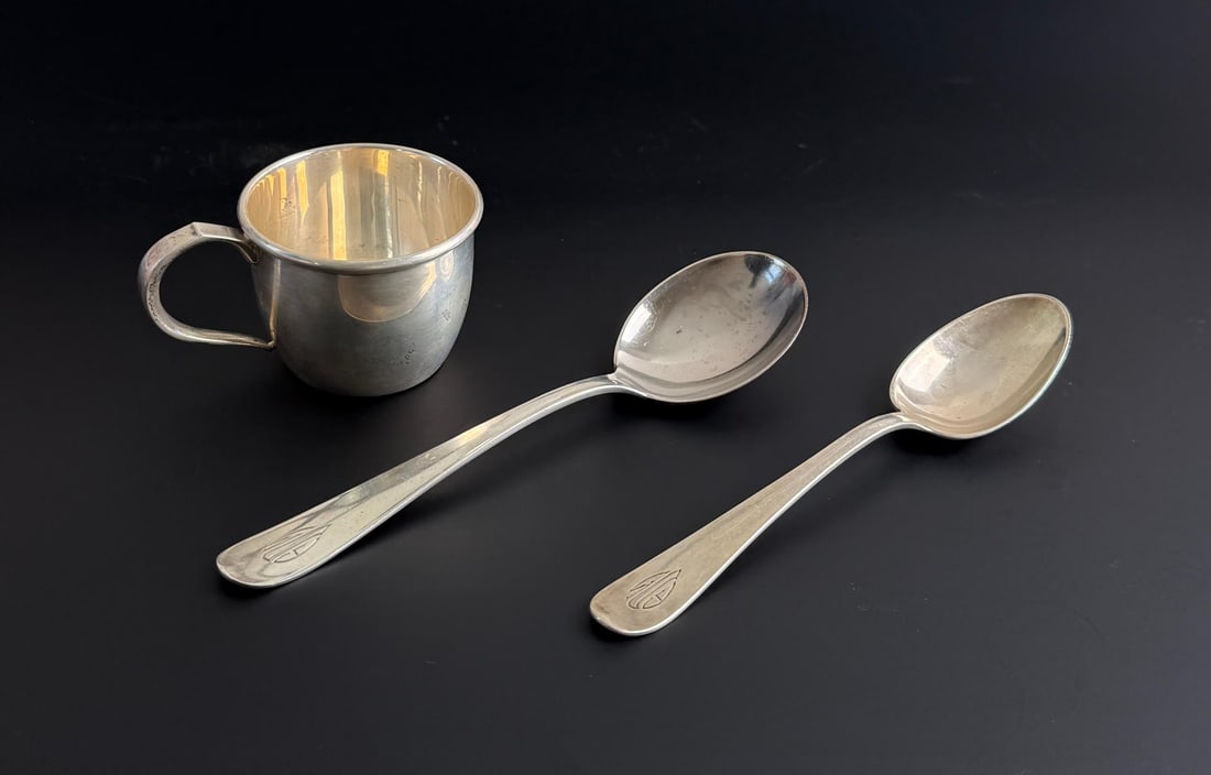 Sterling Silver Flatware and Baby Cup: 130.6 grams.