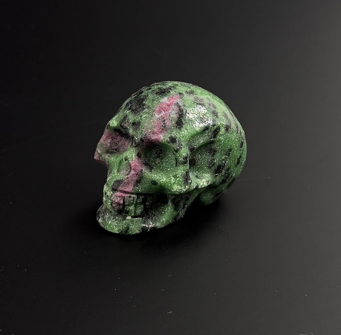 Ruby Zoisite Skull Carving: 1 1/4" by 1 3/8" by 1 7/8". 108 grams.