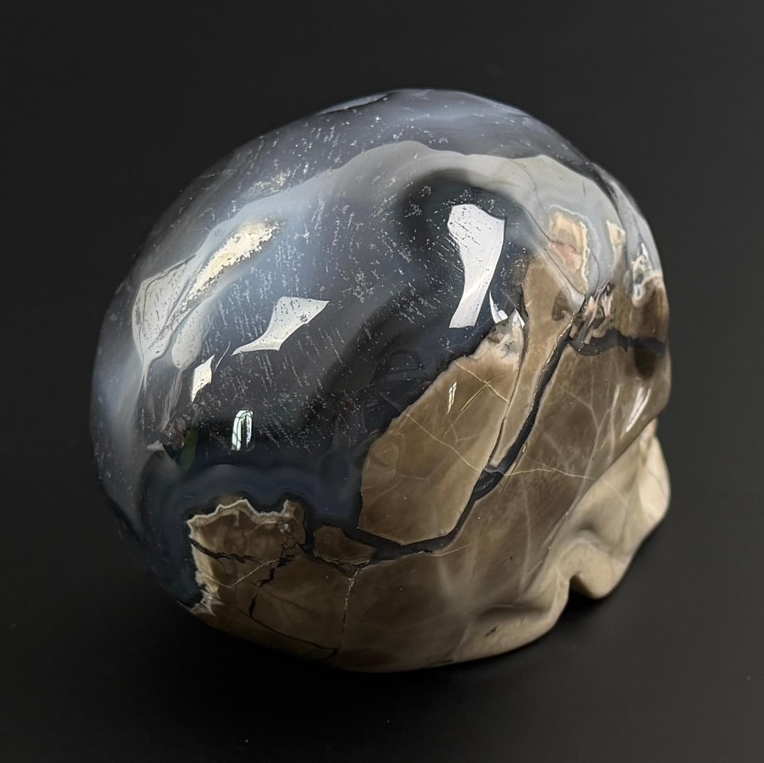 Volcanic Agate Carved Skull: 2 3/4" by 2 3/4" by 3 7/8". 709 grams.