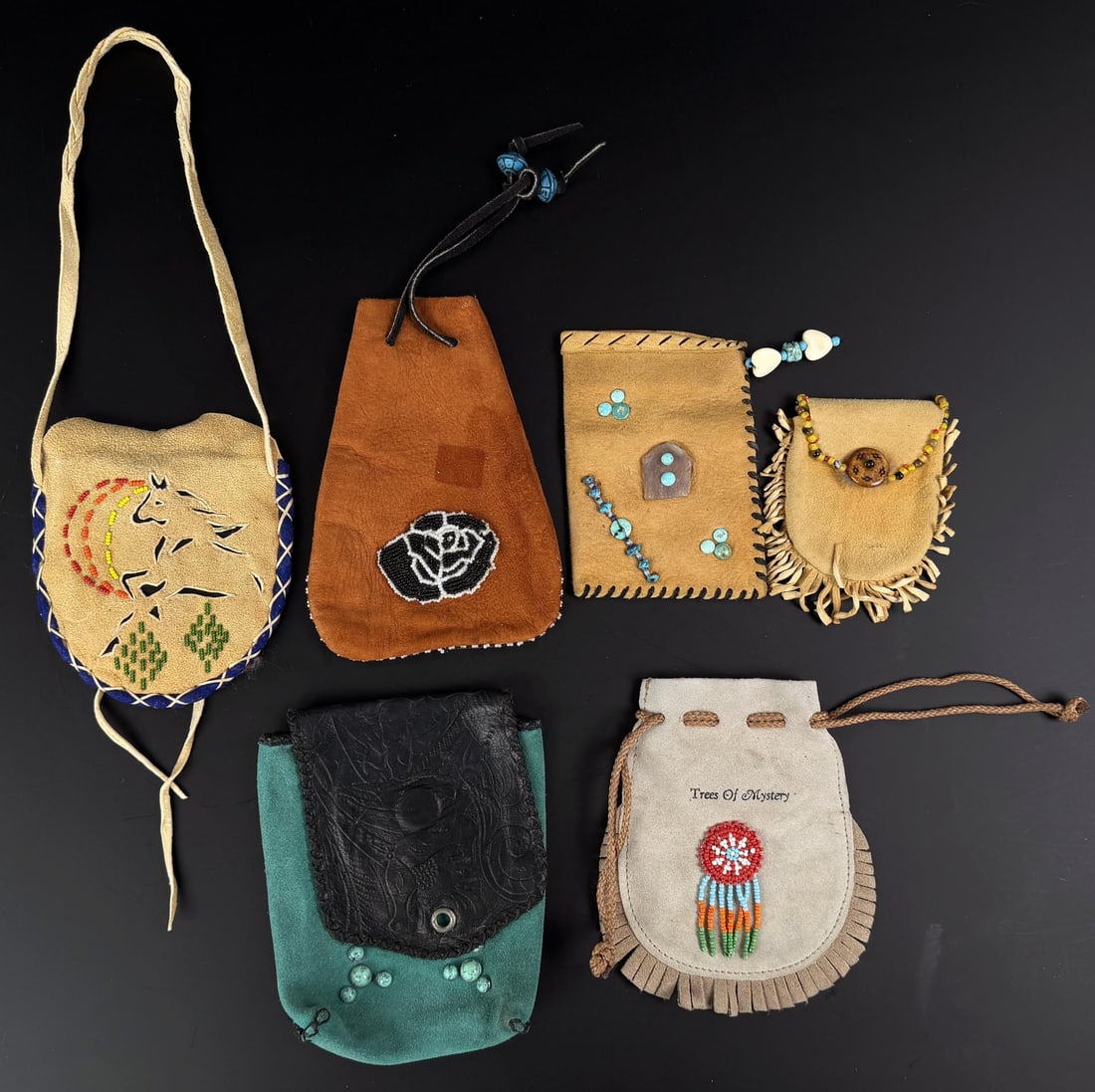 Native American Indian Beaded Medicine Bags: The largest bag is 5 3/8" by 6 5/8". Second Half of the 20th Century.