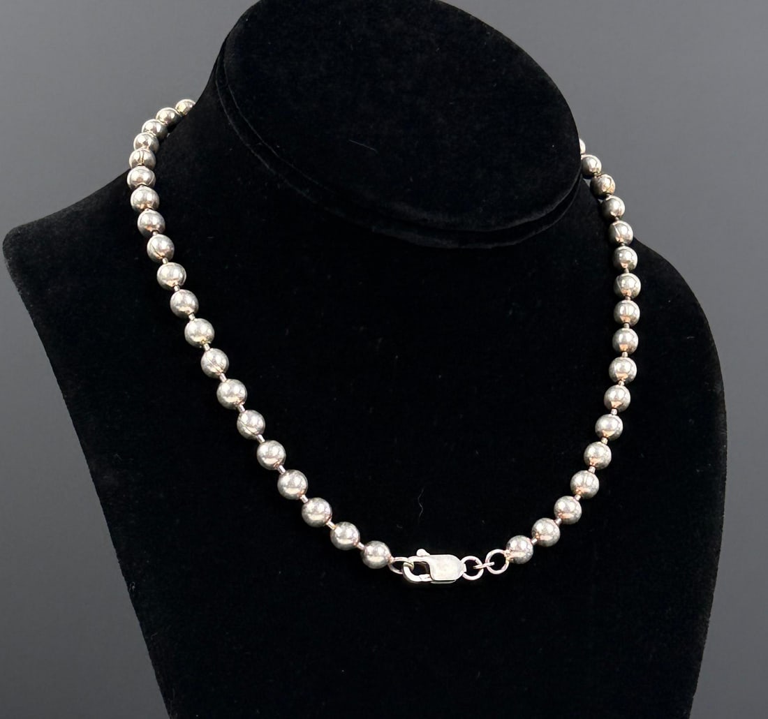 Sterling Silver Ball Bead Necklace: 7 1/2" long as displayed. 39.70 grams.