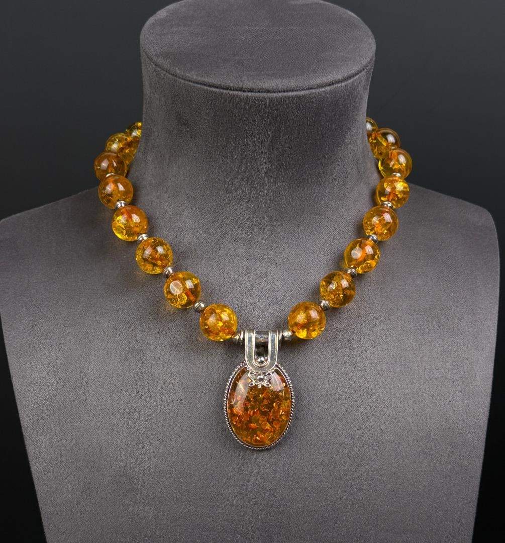 Sterling Silver Baltic Amber Necklace: 75 grams. 10 5/8" long as displayed.