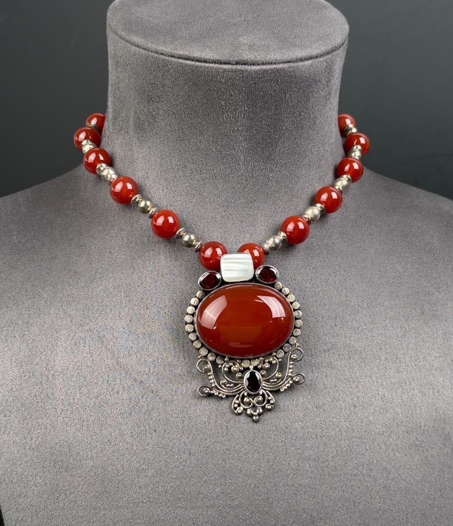 Sterling Silver Carnelian Necklace: 10 1/4" long as displayed. 89 grams.
