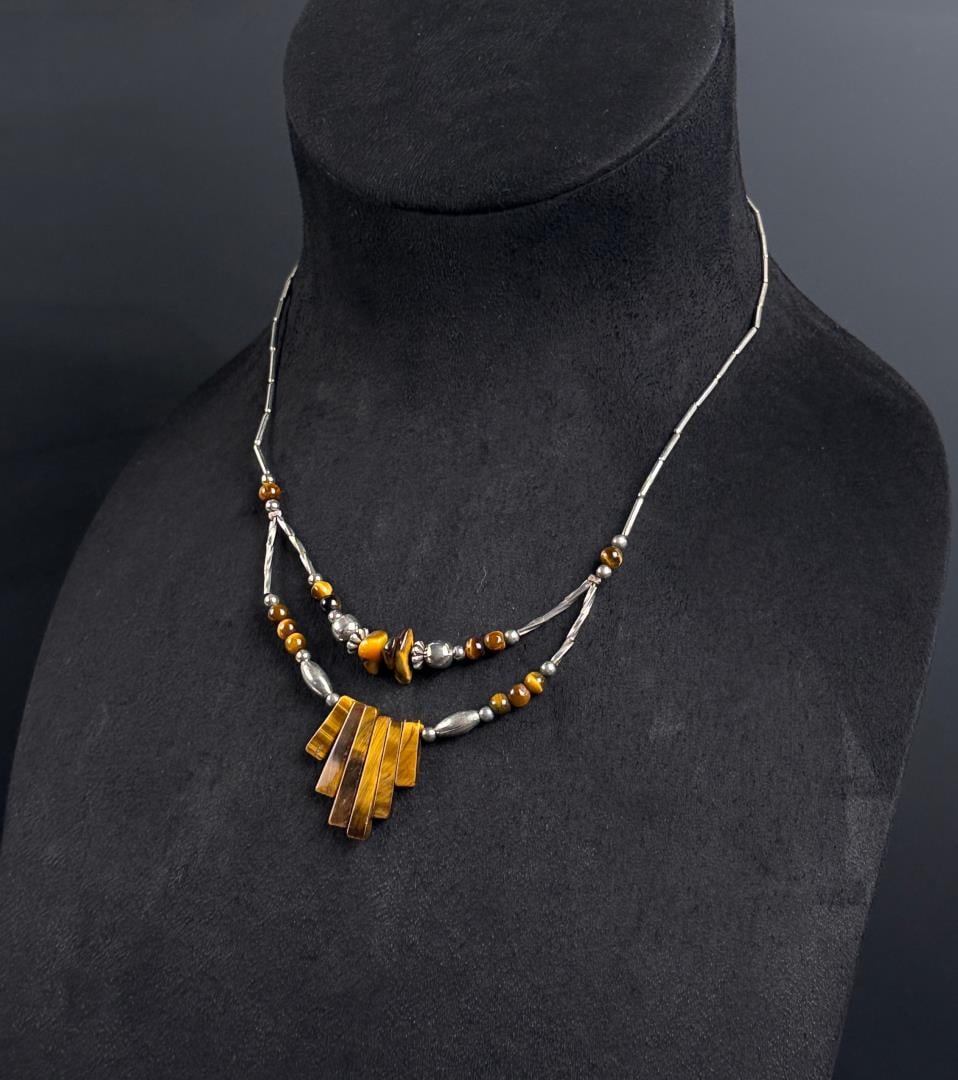 Navajo Sterling Silver Tigers Eye Necklace: 7 7/8" long as displayed. 14.02 grams.