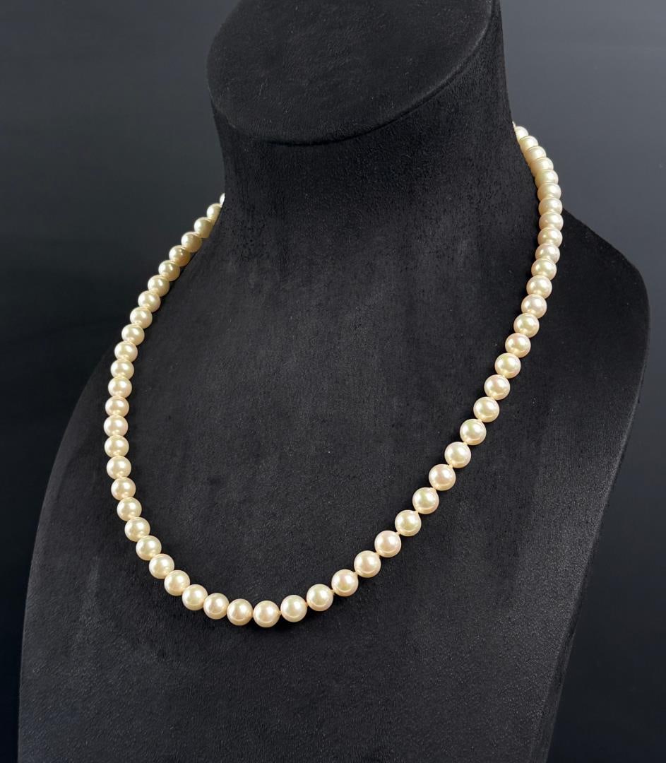 Sterling Silver Cultured Pearl Necklace: 11 3/8" long as displayed.