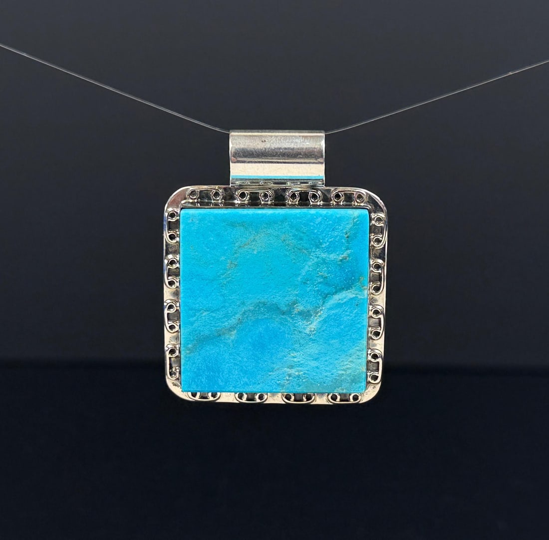 Jay King Desert Rose Trading Turquoise Pendant: Sterling Silver. 1 7/8" by 1 1/2". 22.03 grams.