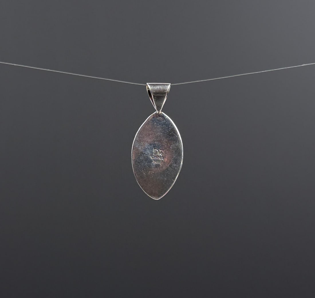 Jay King Desert Rose Trading Turquoise Pendant: Sterling Silver and Coral. 1 3/4" long. 3.22 grams.