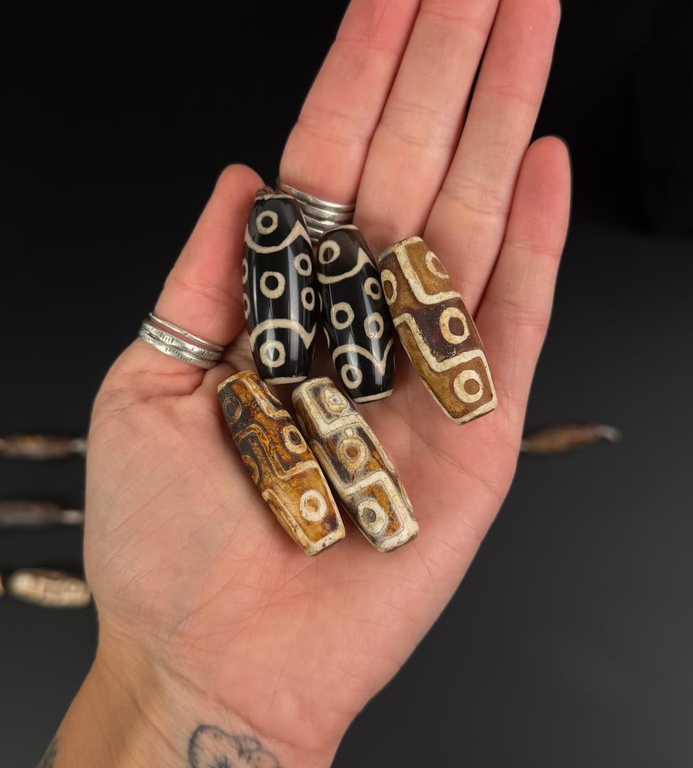 Collection of Tibetan Dzi Beads: Nice grouping.