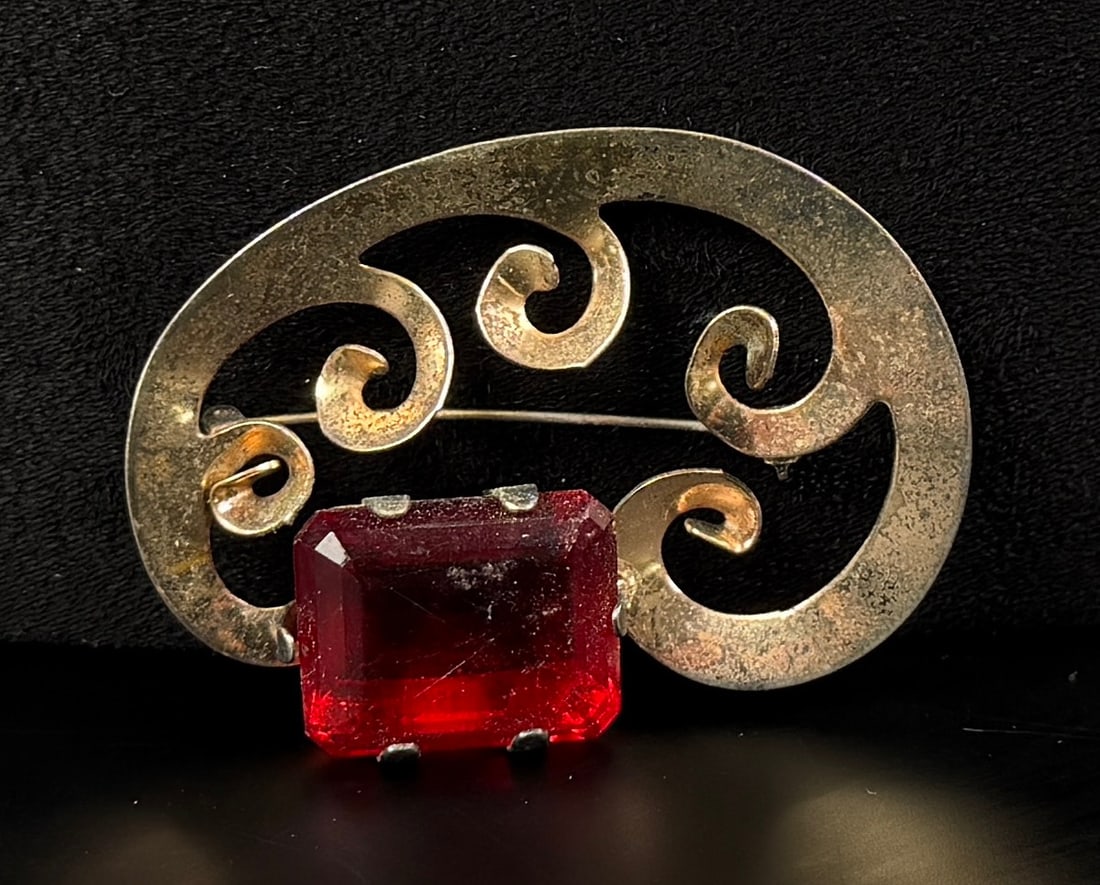 Sterling Silver Rhinestone Brooch: 1 3/4" by 2 1/2". 19.32 grams.
