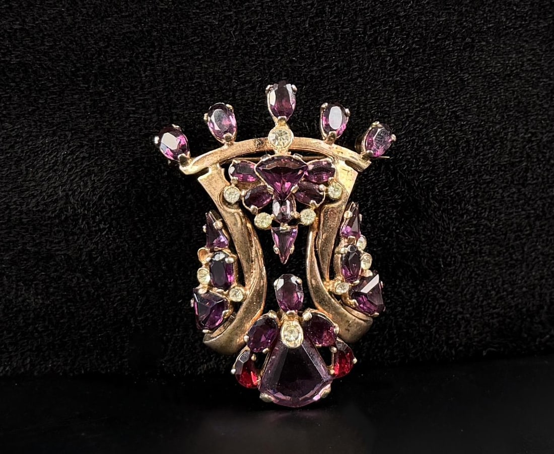 Sterling Silver Rhinestone Brooch: 19.51 grams. 1 7/8" by 1 1/4" by 1/2".