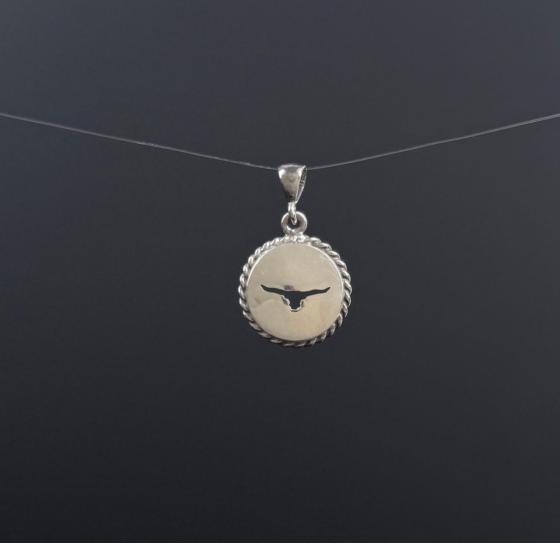 Ambriz Jewelry Sterling Silver Longhorn Pendant: 5.51 grams. 1 1/4" by 3/4" by 1/8".