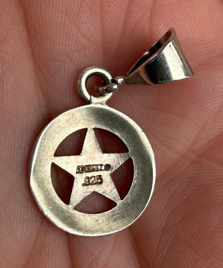 Ambriz Jewelry Sterling Silver Texas Star Pendant: 2.09 grams. 1 1/8" by 1/2" by 1/8".