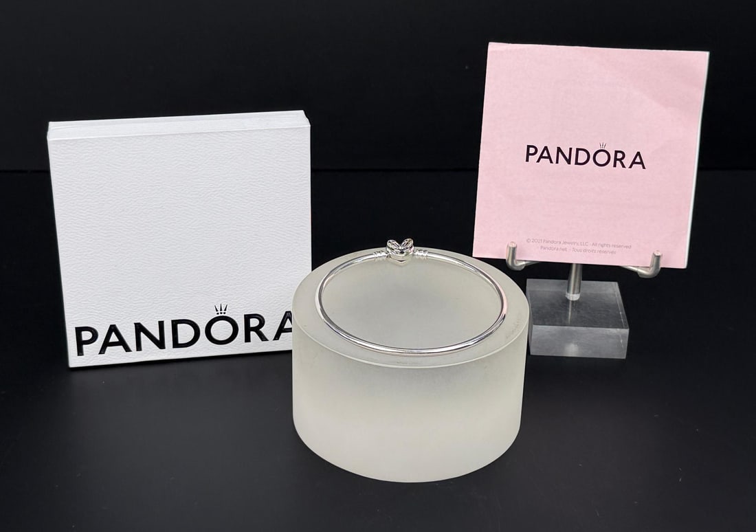 Pandora Moments Heart & Butterfly Bracelet: Sterling Silver. 8" inner circumference. 9.94 grams. Comes with original box.