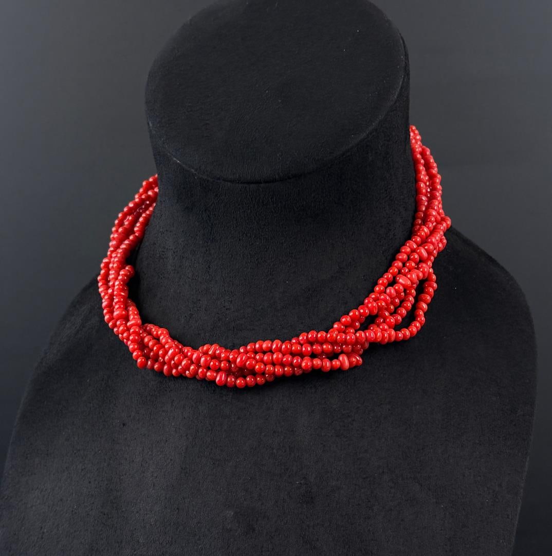 Sterling Silver Coral Multi Strand Necklace: 8 1/8" long as shown. 57.47 grams total weight.