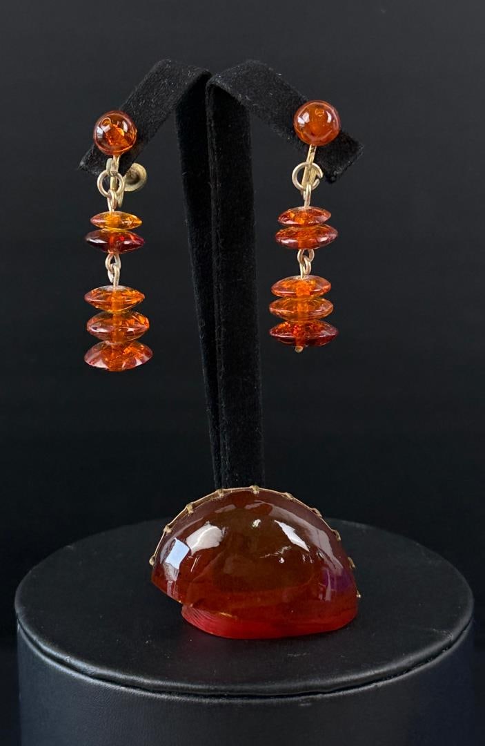 Collection of Baltic Amber Jewelry: Brooch is 1 3/8" wide, earrings are 1 1/2" long as shown. 13.99 grams total weight.